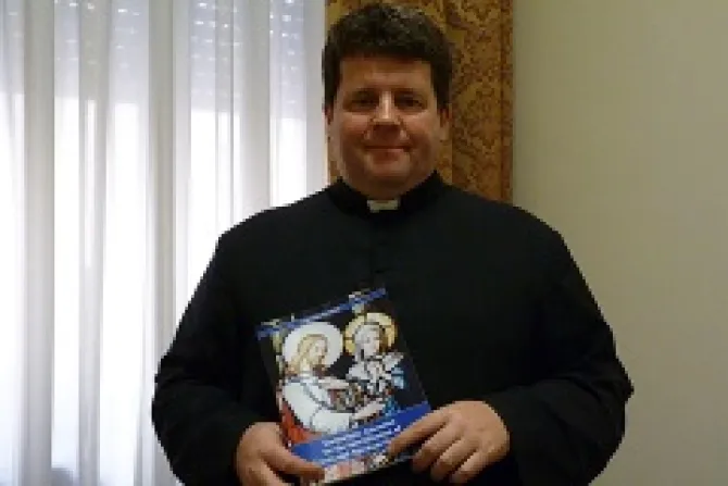 Rev Msgr Richard Soseman with his new book Eucharistic Adoration for the Sanctification of Priests and Spiritual Maternity Credit Estefania Aguirre CNA 2 1 13