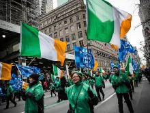 Revelers march in the annual St. Patrick's Day Parade along Fifth Ave in Manhattan on March 17, 2014. 