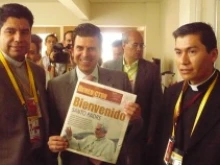 Ricardo Sheffield, mayor of Leon, receives the newspaper Benedictus, dedicated to the Pope's visit, March 22, 2012.