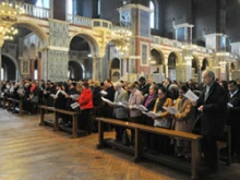 People participate in the Rite of Election in the Westminster cathedral. 