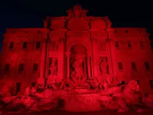 Rome's Trevi Fountain, illuminated red for persecuted Christians. 
