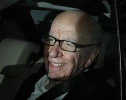 Rupert Murdoch smiles at photographers as he is driven from News International's headquarters on July 13, 2011 in London, England. Photo by Peter Macdiarmid / Getty Images News / Getty Images?w=200&h=150