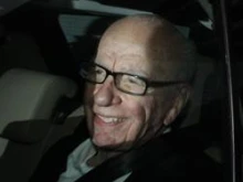 Rupert Murdoch smiles at photographers as he is driven from News International's headquarters on July 13, 2011 in London, England. Photo by Peter Macdiarmid / Getty Images News / Getty Images