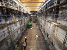 The interior of the fire-damaged Mission San Gabriel April 19, 2021, after new steel beams were installed to begin construction of a new roof.