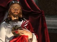 A statue of the Sacred Heart of Jesus inside the Basilica of the Sacred Heart of Jesus in Rome Italy on June 9 2015 /