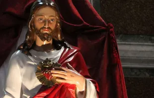 A statue of the Sacred Heart of Jesus inside the Basilica of the Sacred Heart of Jesus in Rome Italy on June 9 2015 /  