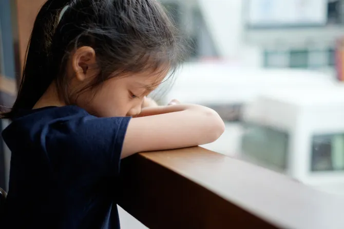 Sad child Credit supparsom via Shutterstock CNA