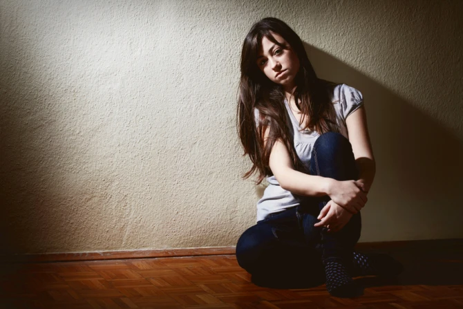 Sad teenage girl Credit Mita Stock Images  Shutterstock 