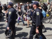 San Francisco Police are heckled by protestors during the May 1, 2012 protests. 