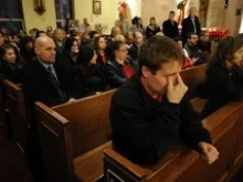 Mourners gather inside the St. Rose of Lima Roman Catholic Church at a vigil service for victims of the Sandy Hook School shooting December 14, 2012 in Newtown, Connecticut.