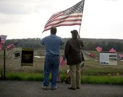 Scott and Walter Neilly, brothers, look over the crash site of Flight 93 in Shanksville, Pa. ?w=200&h=150