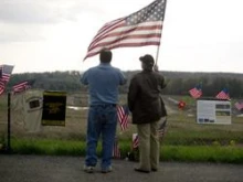 Scott and Walter Neilly, brothers, look over the crash site of Flight 93 in Shanksville, Pa. 