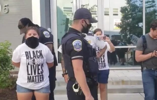 Metropolitan Police arrest a Students for Life volunteer, Aug. 1, 2020. Students for Life
