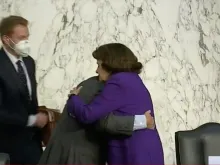 Sen. Diane Feinstein and Sen. Lindsey Graham embrace after the hearings of the Senate Judiciary Committee, Oct. 15, 2020. 