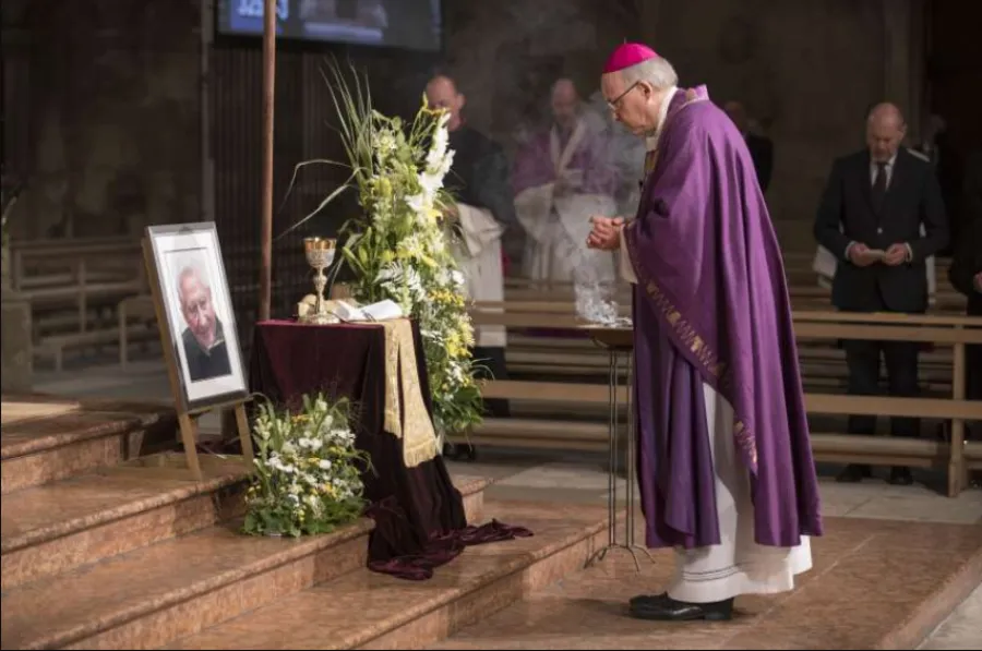 Bishop Rudolf Voderholzer stands before a portrait of Msgr. Georg Ratzinger at Regensburg Cathedral July 8, 2020. ?w=200&h=150