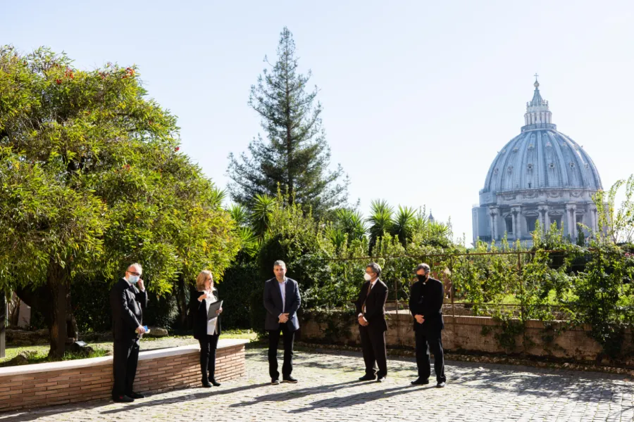 Director Evgeny Afineevsky, center, receives the Kineo Movie for Humanity award in the Vatican Gardens Oct. 22, 2020. ?w=200&h=150
