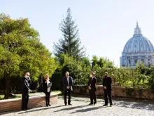 Director Evgeny Afineevsky, center, receives the Kineo Movie for Humanity award in the Vatican Gardens Oct. 22, 2020. 