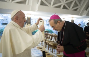 Pope Francis bestows the pallium on newly appointed Latin Patriarch Pierbattista Pizzaballa Oct. 28, 2020.   Vatican Media.