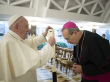 Pope Francis bestows the pallium on newly appointed Latin Patriarch Pierbattista Pizzaballa Oct. 28, 2020. 