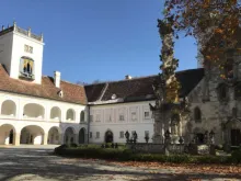 The inner courtyard of Heiligenkreuz Abbey in the Vienna Woods, Austria. 