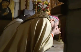 Patriarch Pierbattista Pizzaballa prays in the Church of the Holy Sepulchre in Jerusalem Dec. 4, 2020. Screenshot from livestream