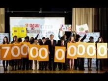 Secretary-General Ban Ki-moon (center) and students of the New Explorations into Science, Mathematics and Technology (Nest+m) School. 