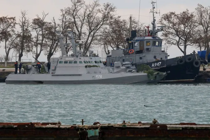 Seized Ukrainian military vessels are seen in a port of Kerch Crimea Nov 26 2018 Russian forces boarded and captured the ships Sunday Credit STR AFP Getty Images CNA