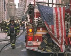 Sept 13, 2001: Fire fighters continue to battle smouldering fires and clean up wreckage at the WTC. Photo by Andrea Booher-FEMA News Photo?w=200&h=150