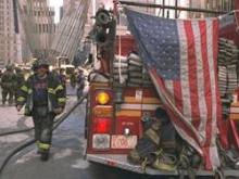 Sept 13, 2001: Fire fighters continue to battle smouldering fires and clean up wreckage at the WTC. Photo by Andrea Booher-FEMA News Photo