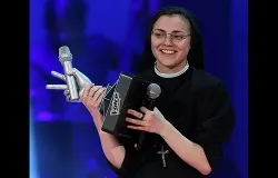 Singing nun Sr. Cristina Scuccia holds her trophy after winning 'The Voice of Italy' in Milan on June 5, 2014. ?w=200&h=150