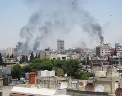 Smoke billows skyward as homes and buildings are shelled June 9, 2012 in the city of Homs, Syria. ?w=200&h=150