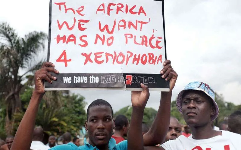 Foreign nationals in South Africa during an anti-xenophobia match outside the city hall of Durban in 2015. ?w=200&h=150
