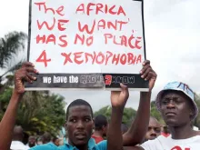 Foreign nationals in South Africa during an anti-xenophobia match outside the city hall of Durban in 2015. 