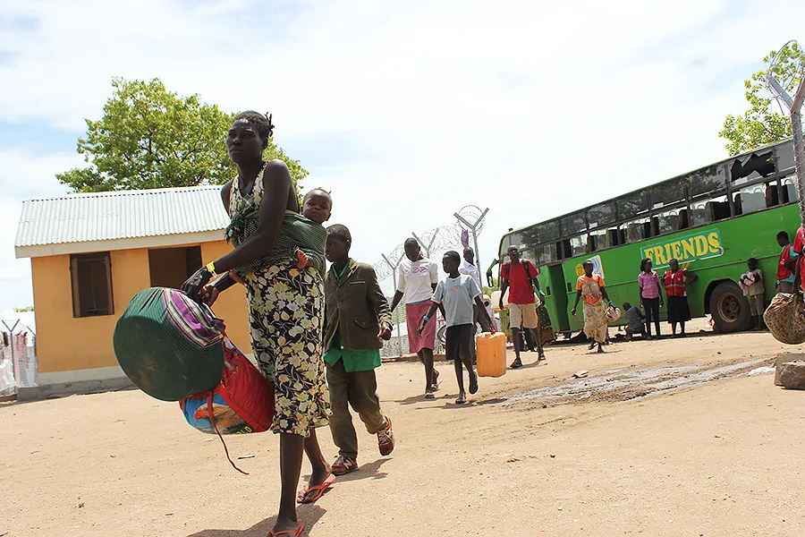 South Sudanese refugees arrive at a refugee camp in Uganda. ?w=200&h=150
