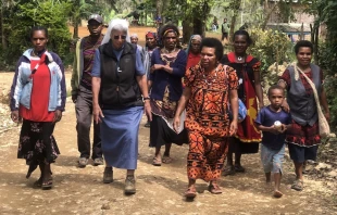 Sr. Lorena Jenal walks with local people from the Diocese of Mendi in Papua New Guinea. Courtesy Diocese of Mendi.