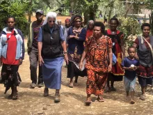 Sr. Lorena Jenal walks with local people from the Diocese of Mendi in Papua New Guinea. Courtesy Diocese of Mendi.