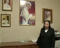 Sr. Marchione poses in front of her recently framed picture of Pope Pius XII?w=200&h=150