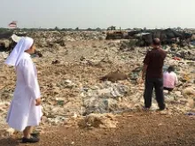 Sr. Mary Clare with volunteers at the landfill outside Lopburi, Thailand. 