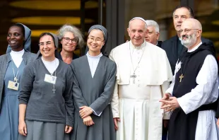 Sr. Alessandra Smerilli (second from left) and Sr. Nathalie Becquart (third from left) pose with Pope Francis and others during the youth synod in 2018. Daniel Ibáñez / CNA