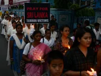 Indians in a solidarity march to pay tribute to the Sri Lankan blasts victims, in Siliguri, on April 26, 2019. 