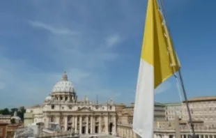 St. Peter's Basilica and the Vatican flag. 