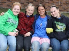 Stacy Molai (second from right) with some of the students she serves. Photo courtesy of FOCUS.