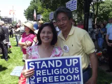 A couple attends the Stand Up for Religious Freedom rally in Washington, D.C.