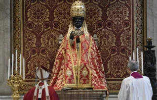 Pope Francis prays before the bronze statue of St. Peter on June 29, 2020. Vatican Media/CNA.