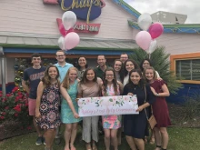 Ashley Stricklin celebrates with friends on the occasion of her First Holy Communion. Courtesy photo.