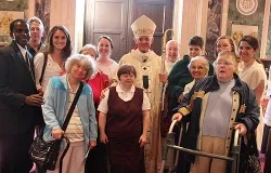 Students from Catholic University of America and their Best Buddies from Bethlehem House visit with Cardinal Wuerl after the White Mass. ?w=200&h=150