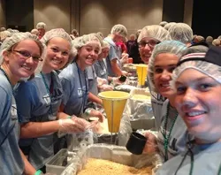 Steubenville conference teens package meals for the hungry in Burkina Faso, Africa. ?w=200&h=150