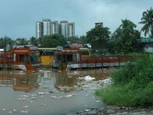 Submerged vehicles on a flooded street are pictured following monsoon rains in Kochi, in the Indian state of Kerala, Aug. 16, 2018. 