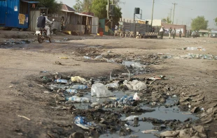 A ditch filled with sewage and garbage in a street of South Sudan.   John Wollwerth via www.shutterstock.com