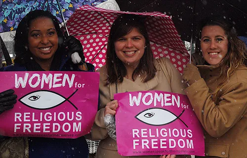 Supporters hold 'Women for Religious Freedom' signs outside of the U.S. Supreme Court building in Washington D.C. on March 25, 2014. ?w=200&h=150
